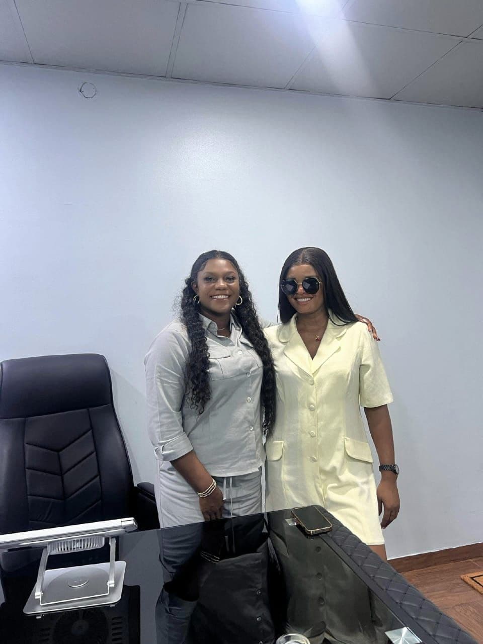 RealCommy Properties team with a client in the office