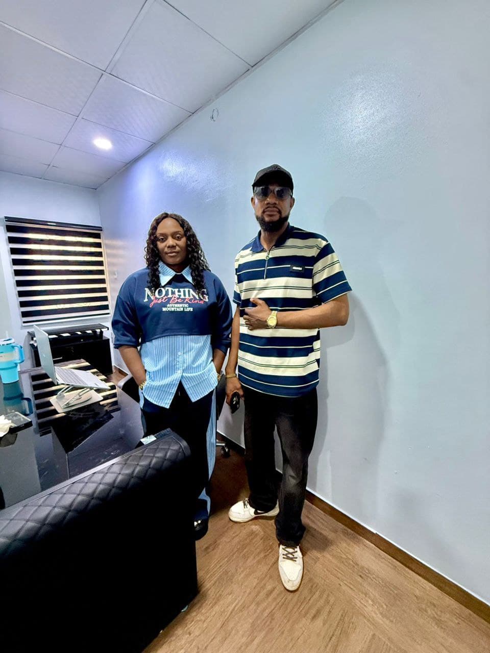 Clients visiting the RealCommy Properties office