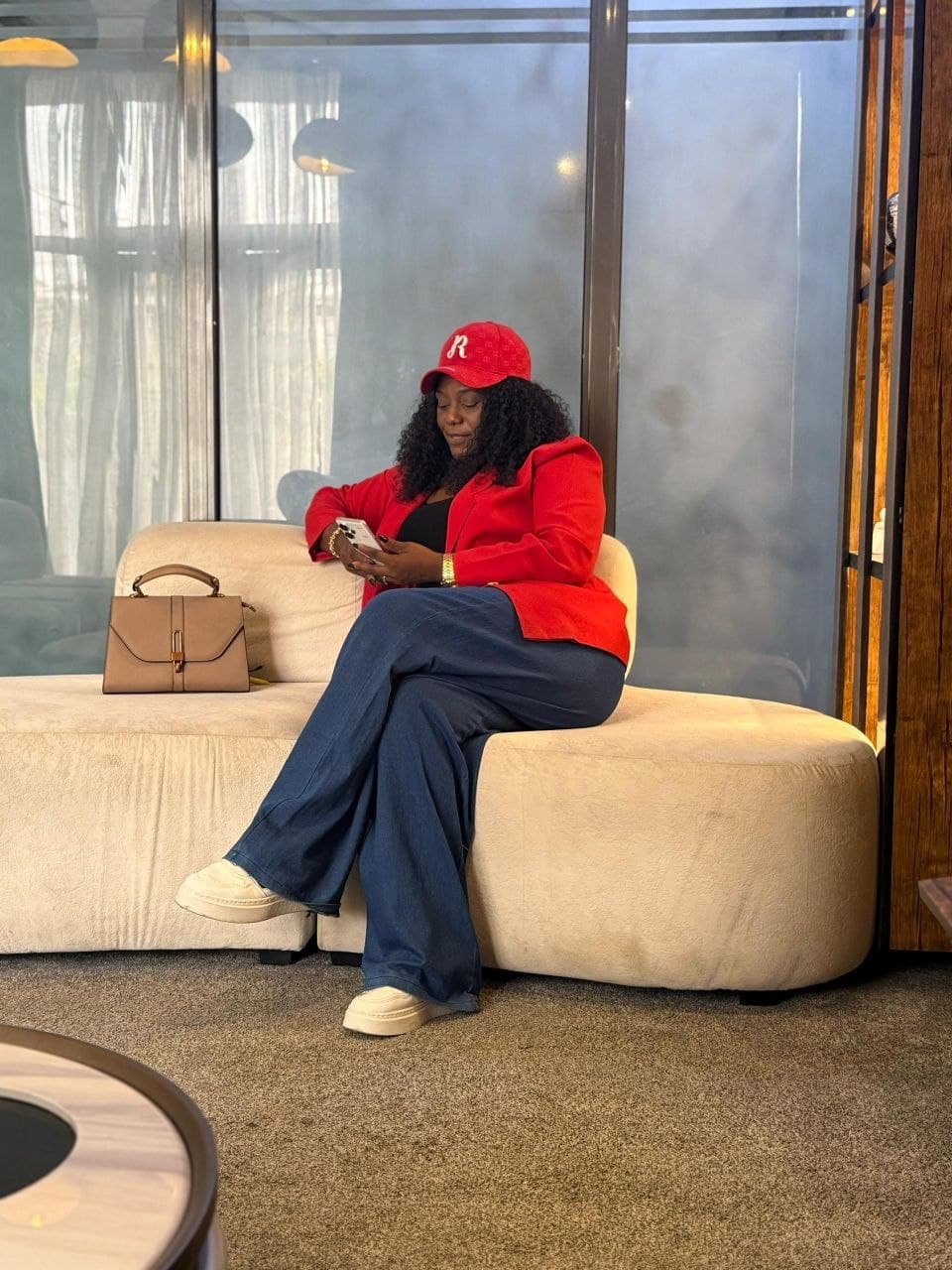 Client relaxing in the RealCommy Properties office lounge